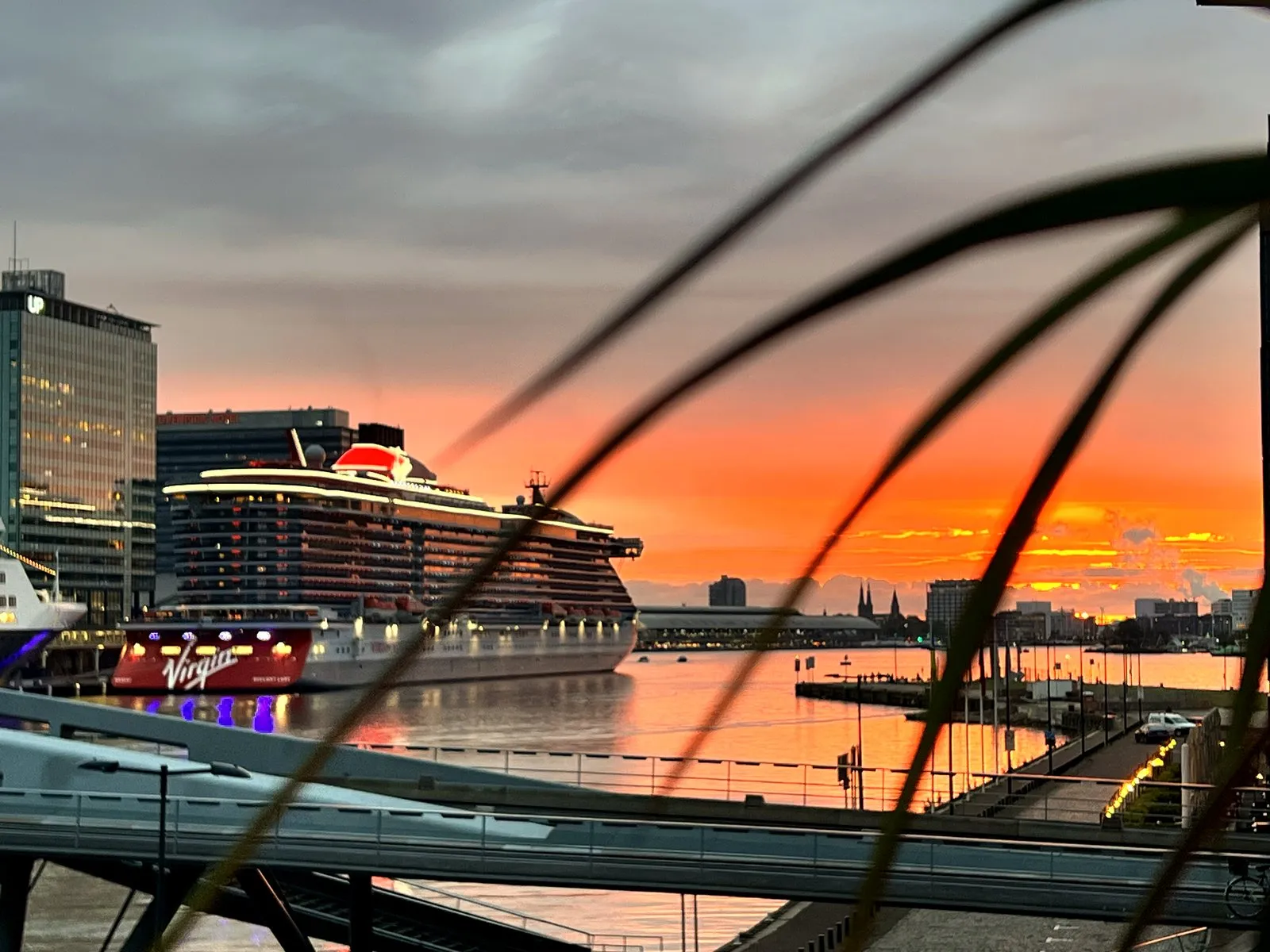 Sunrise over the Amsterdam cruise terminal, seen from the founder's balcony