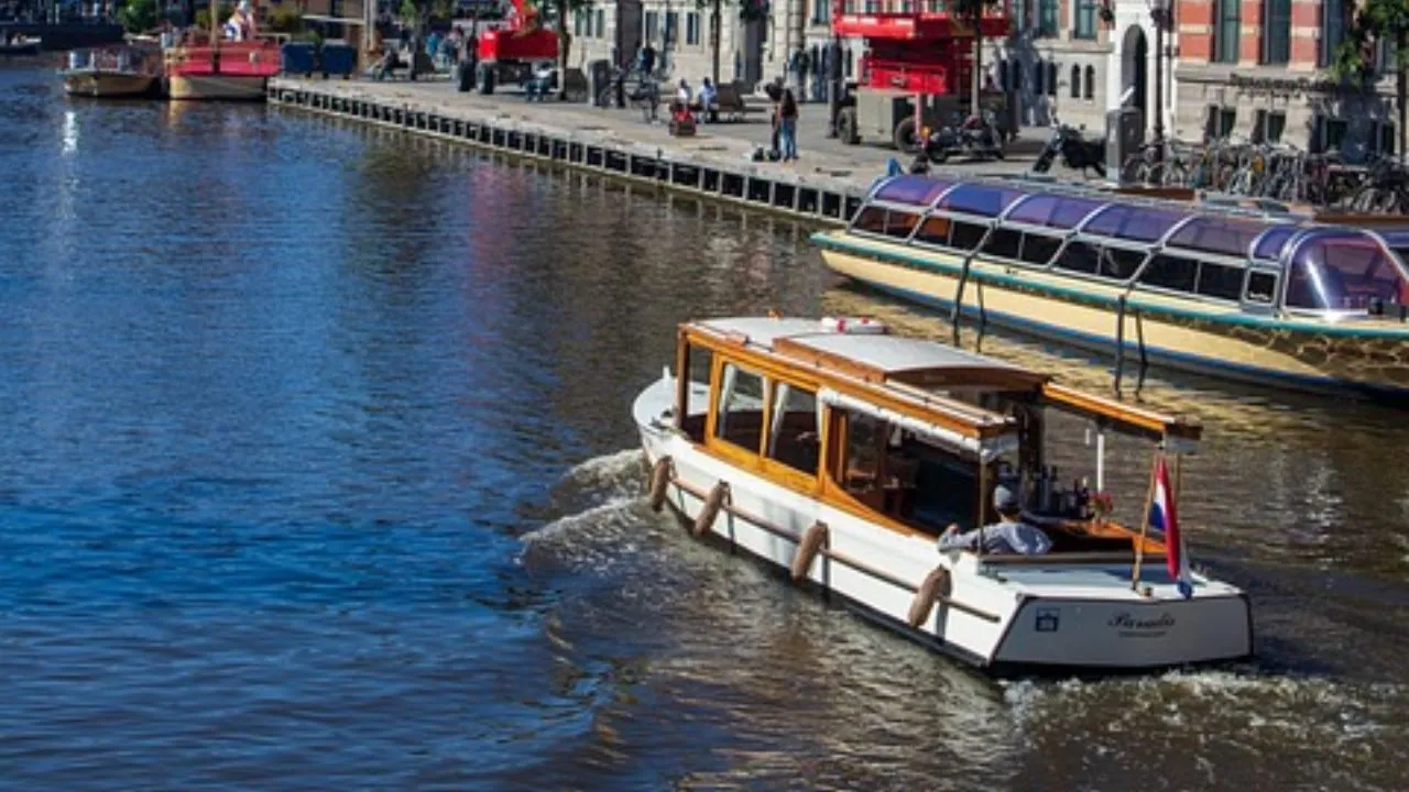 Sail through Amsterdam’s autumn glow on a cozy boat tour